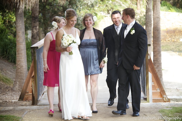 Bridal party walking - wedding photography